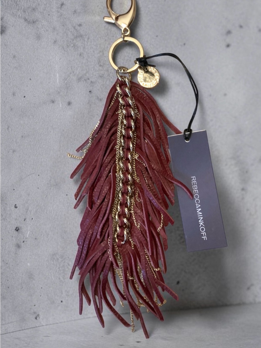 Rebecca Minkoff Burgundy Fringe Tassel Keychain Bag Charm.